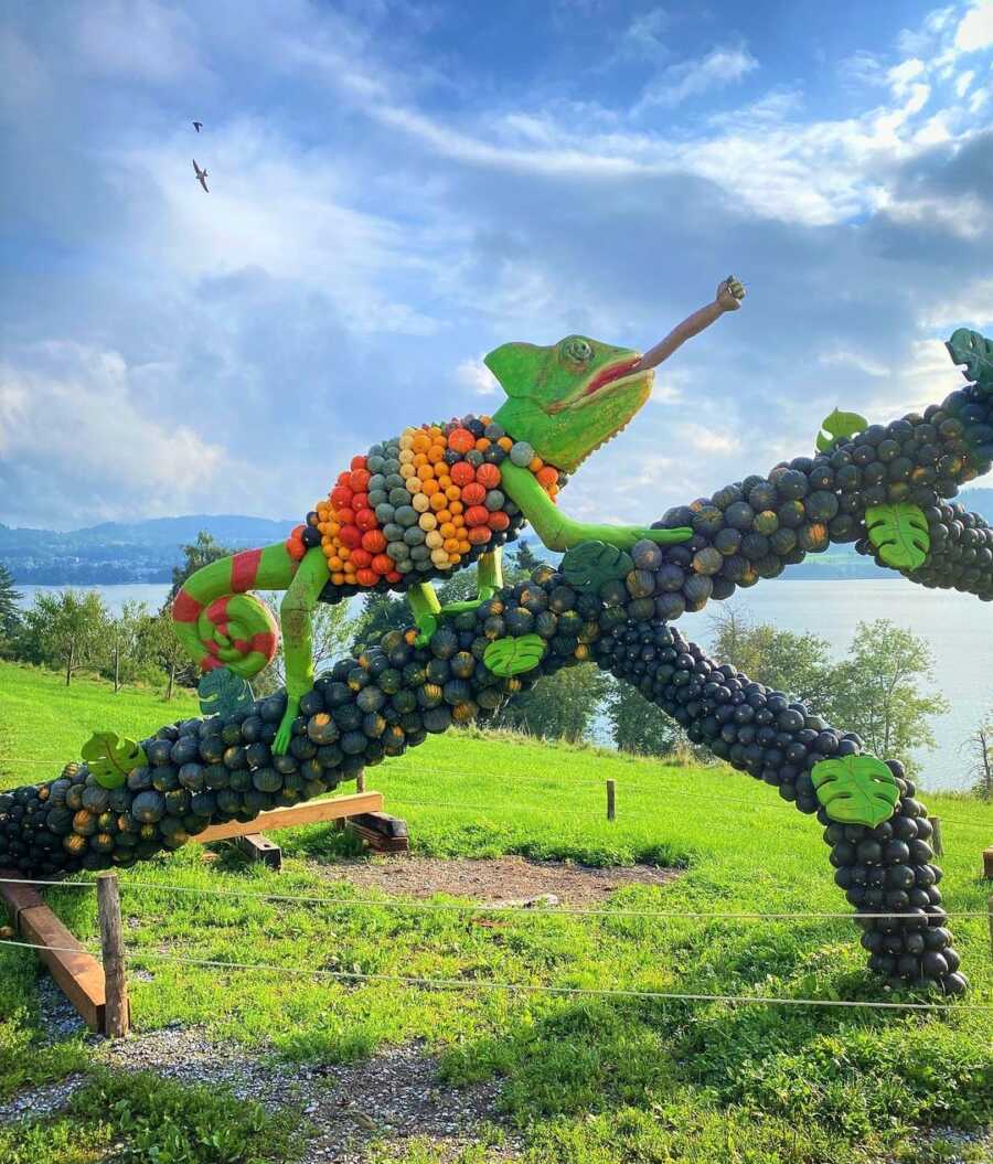 Giant chameleon creation at Jucker Farm's pumpkin exhibition.