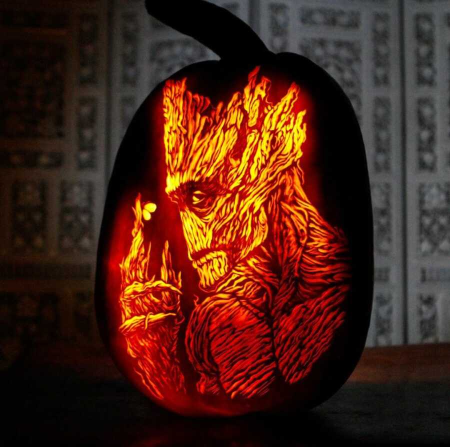 Incredible pumpkin carving of Groot, created by Maniac Pumpkin Carvers.