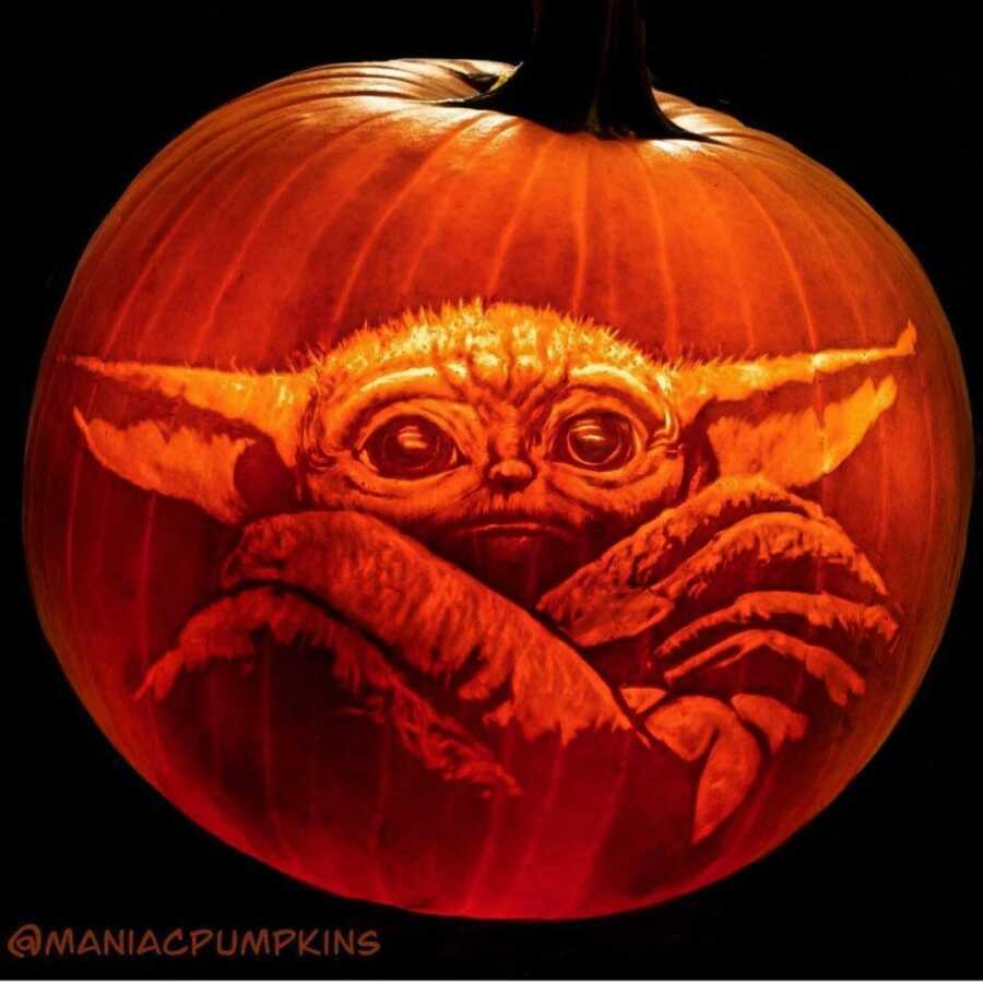 Incredible pumpkin carving of The Child, created by Maniac Pumpkin Carvers.