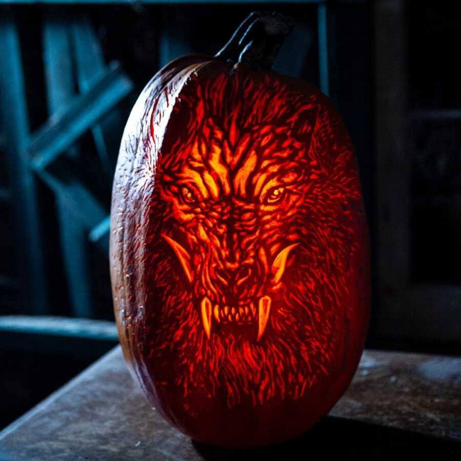 Amazing werewolf pumpkin carving, created by Maniac Pumpkin Carvers.
